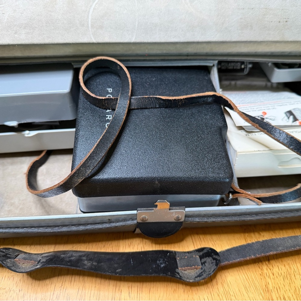 Vintage Polaroid Automatic 100 Land Camera in good overall condition, offered as